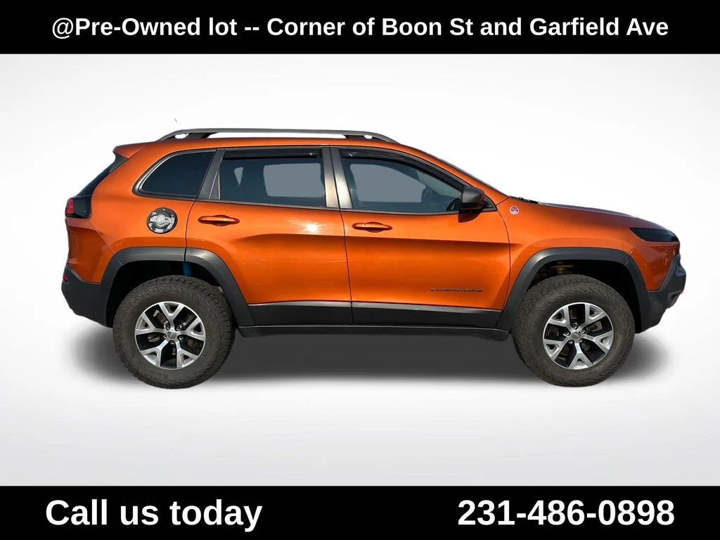 Used 2015 Orange Jeep Trailhawk image 6
