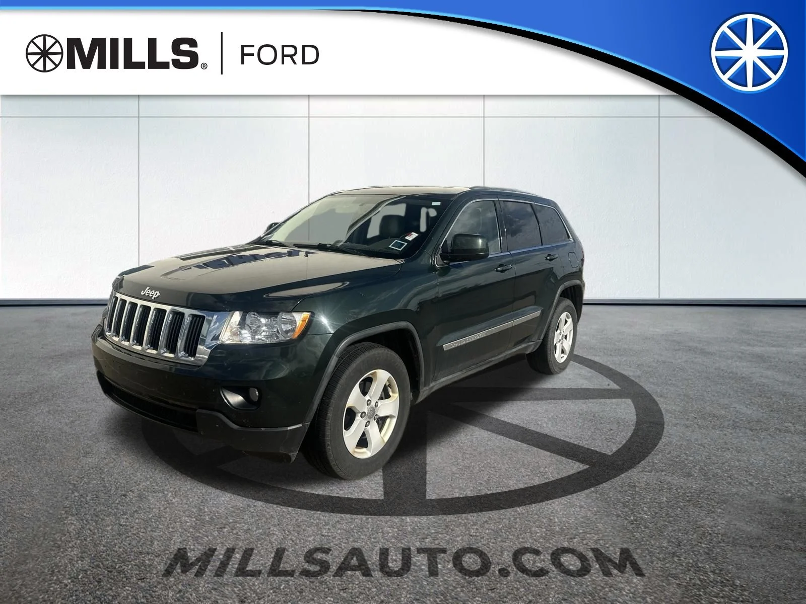 Used 2011 Green Jeep Laredo image 1