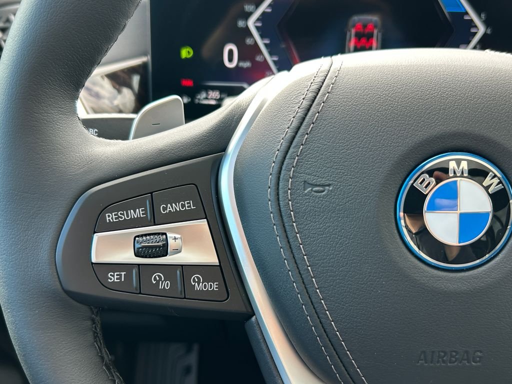 New 2026 Manhattan Green Metallic BMW xDrive50e image 19