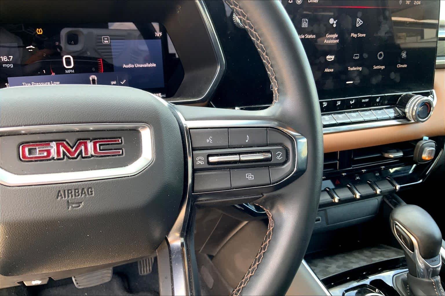 Used 2024 Desert Sand Metallic GMC 4WD AT4 image 24