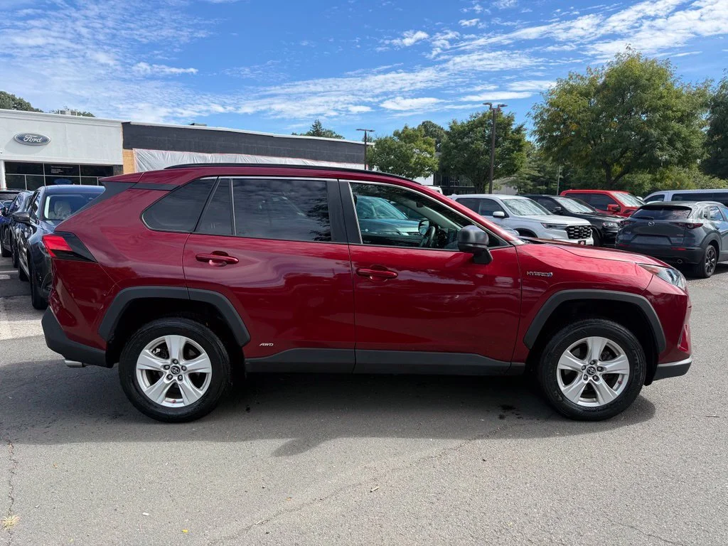 Used 2021 Ruby Flare Pearl Toyota LE image 5