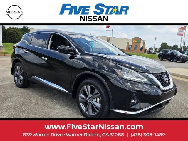 Used 2024 Black Nissan Platinum image 1