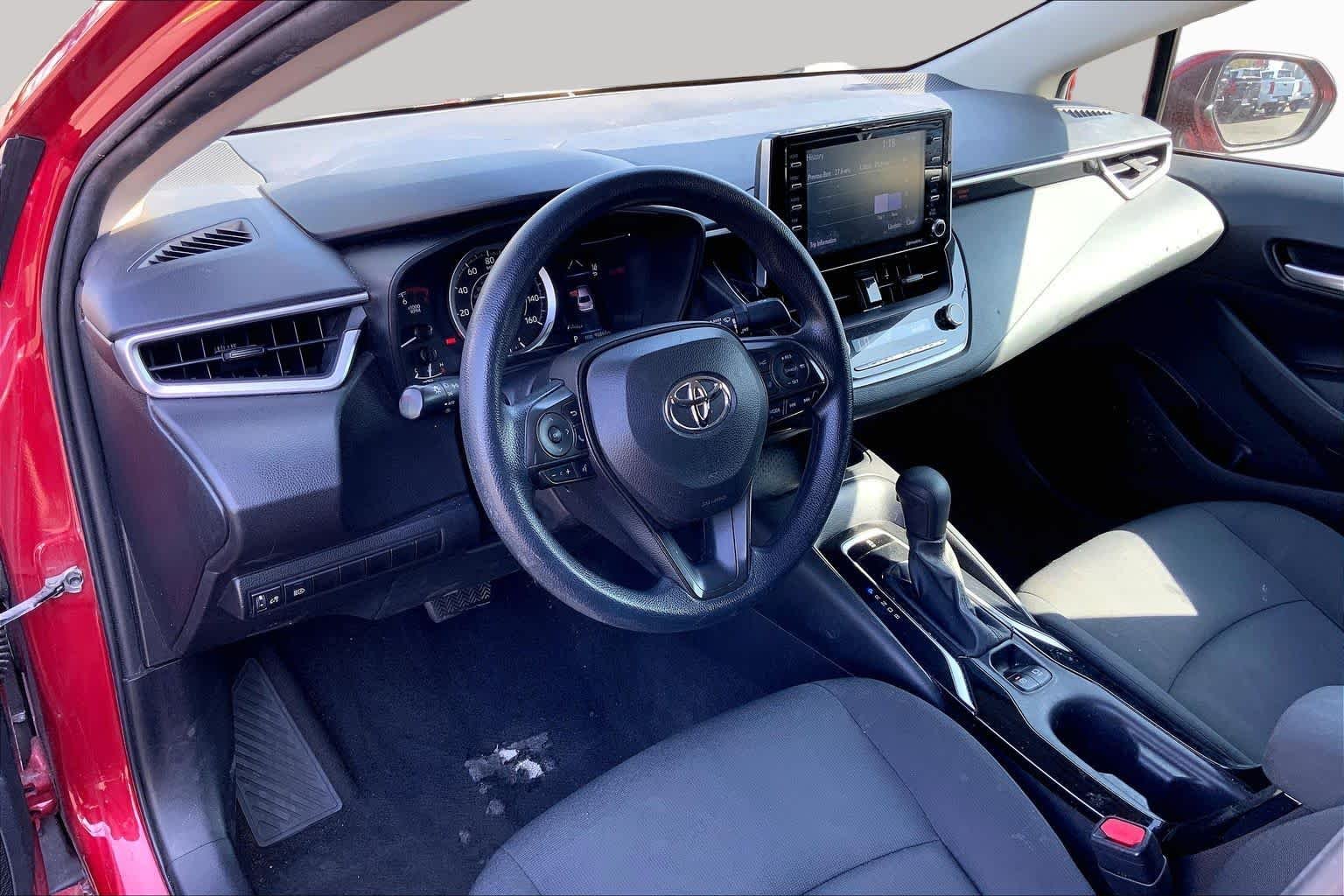 Used 2021 Barcelona Red Metallic Toyota LE image 17