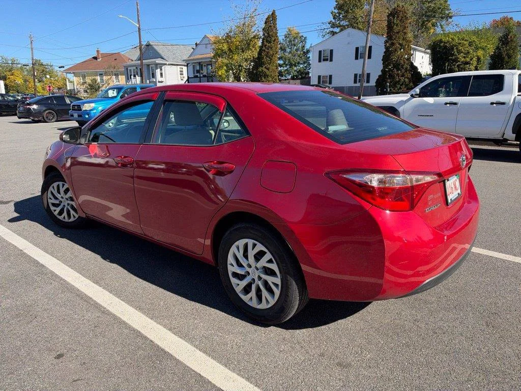 Used 2018 Barcelona Red Metallic Toyota LE image 5