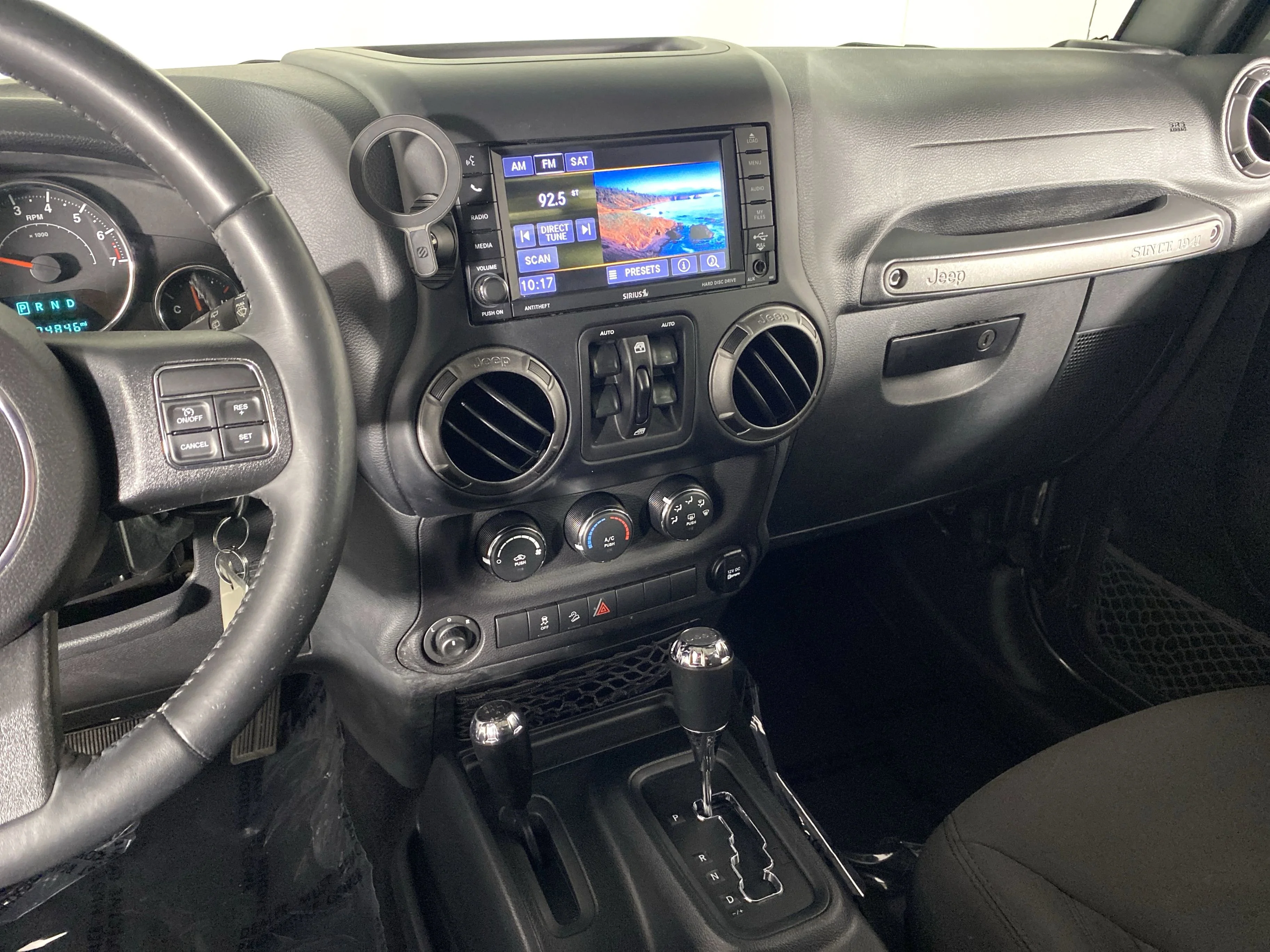 Used 2018 Granite Crystal Metallic Clearcoat Jeep Sport S image 22