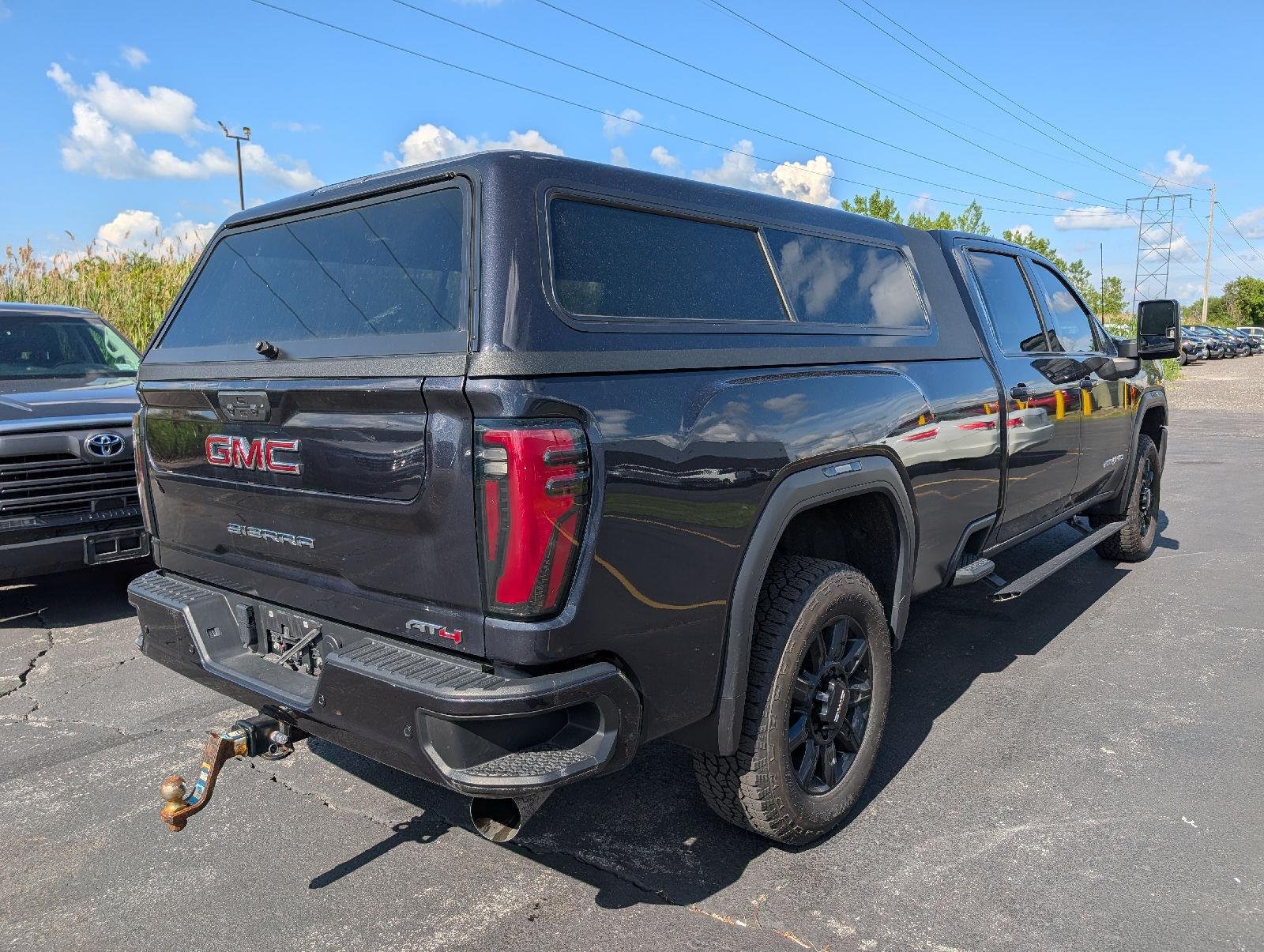 Used 2024 Titanium Rush Metallic GMC AT4 image 8