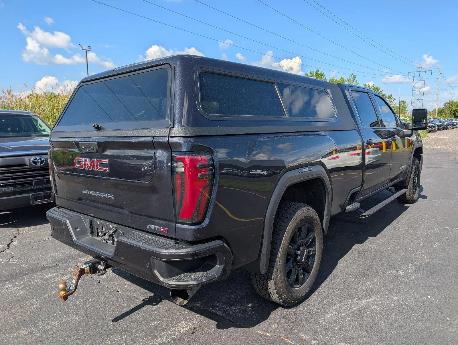 Used 2024 Titanium Rush Metallic GMC AT4 image 8