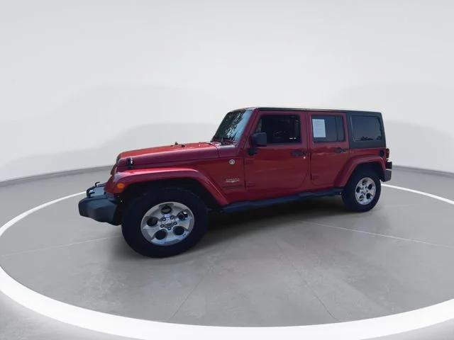 Used 2014 Red Jeep Unlimited Sahara image 5