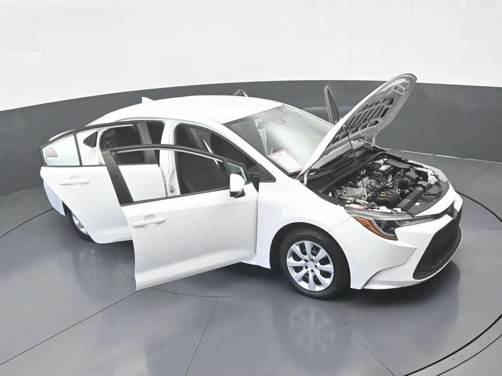 Used 2021 Super White Toyota LE image 59