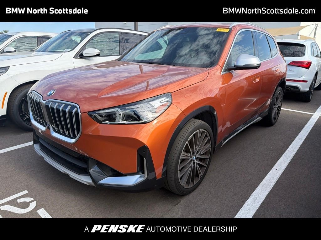 Certified Used 2023 Orange Metallic BMW xDrive28i image 1