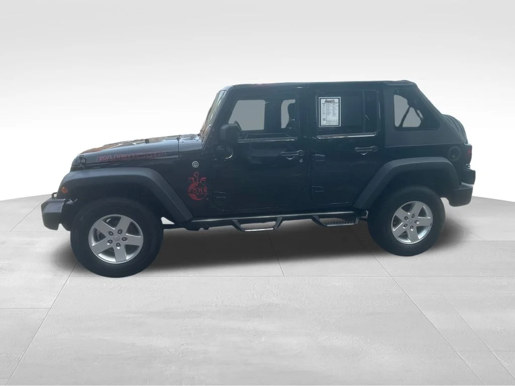Used 2014 Black Jeep Unlimited Rubicon image 5
