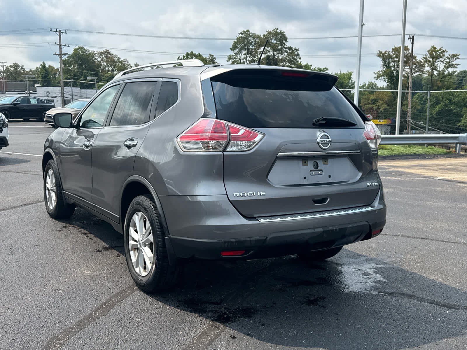 Used 2015 Gun Metallic Nissan SV image 4