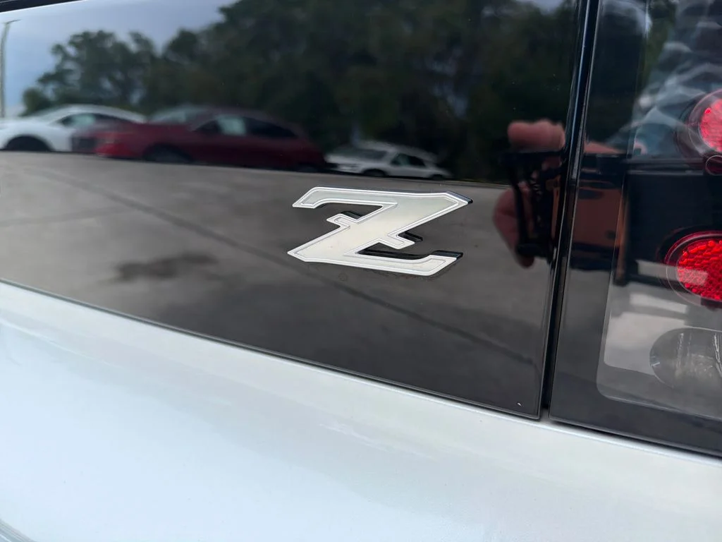 Used 2024 White Nissan Sport image 9