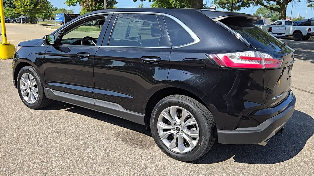 Used 2024 Black Metallic Ford Titanium image 24