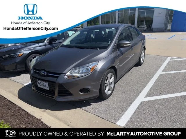 Used 2014 Sterling Gray Metallic Ford SE image 1