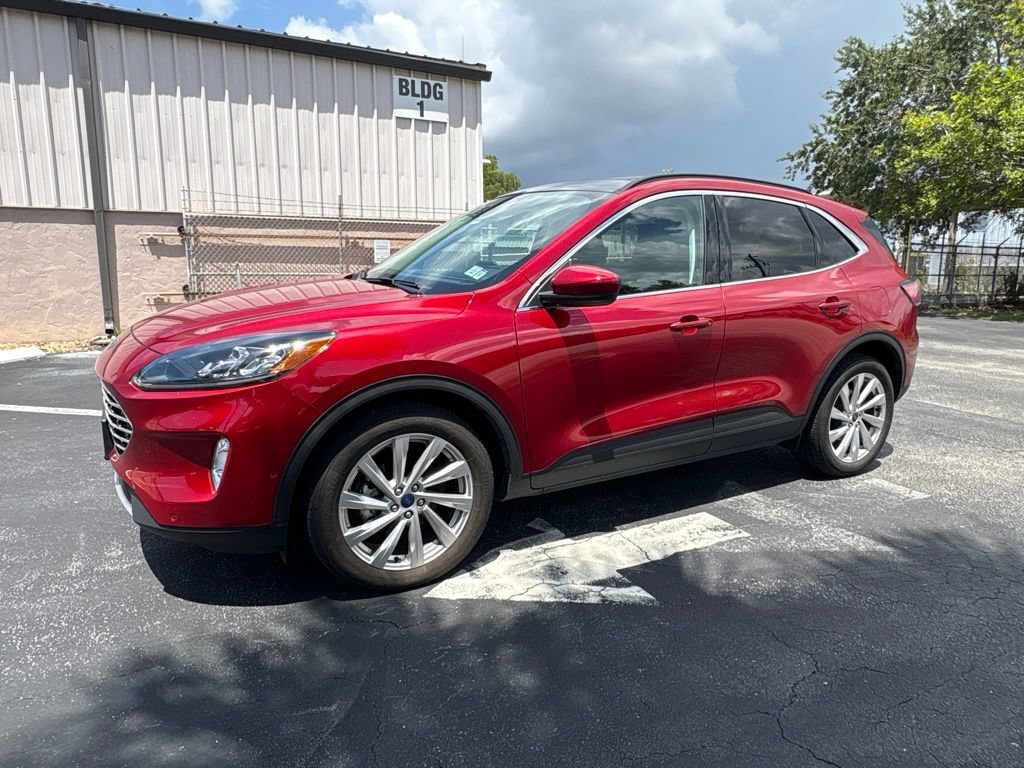 Used 2021 Red Metallic Ford Titanium image 1