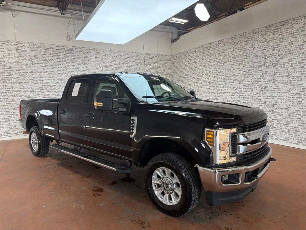 Used 2019 Black Metallic Ford XLT image 1