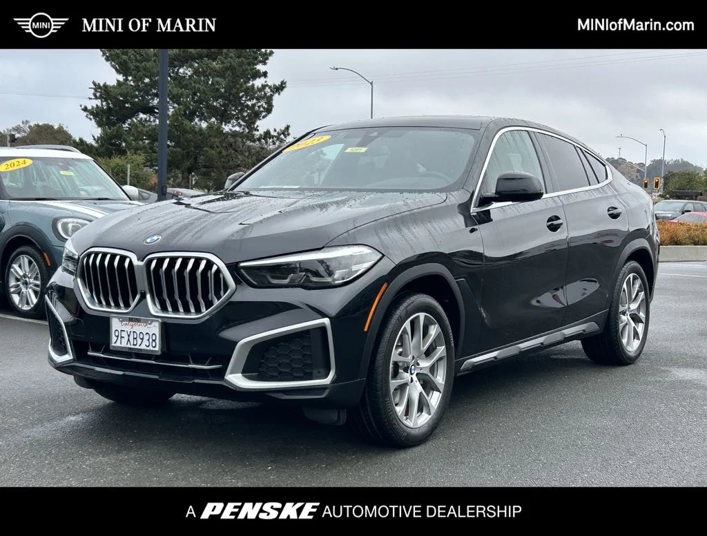 Used 2023 Black BMW xDrive40i image 1