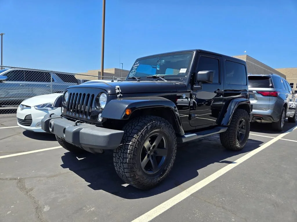 Used 2015 Black Clearcoat Jeep Sahara image 2