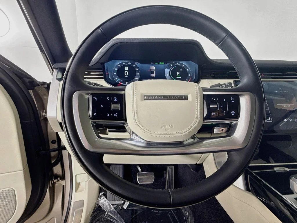 Used 2025 Gold Land Rover SE image 11