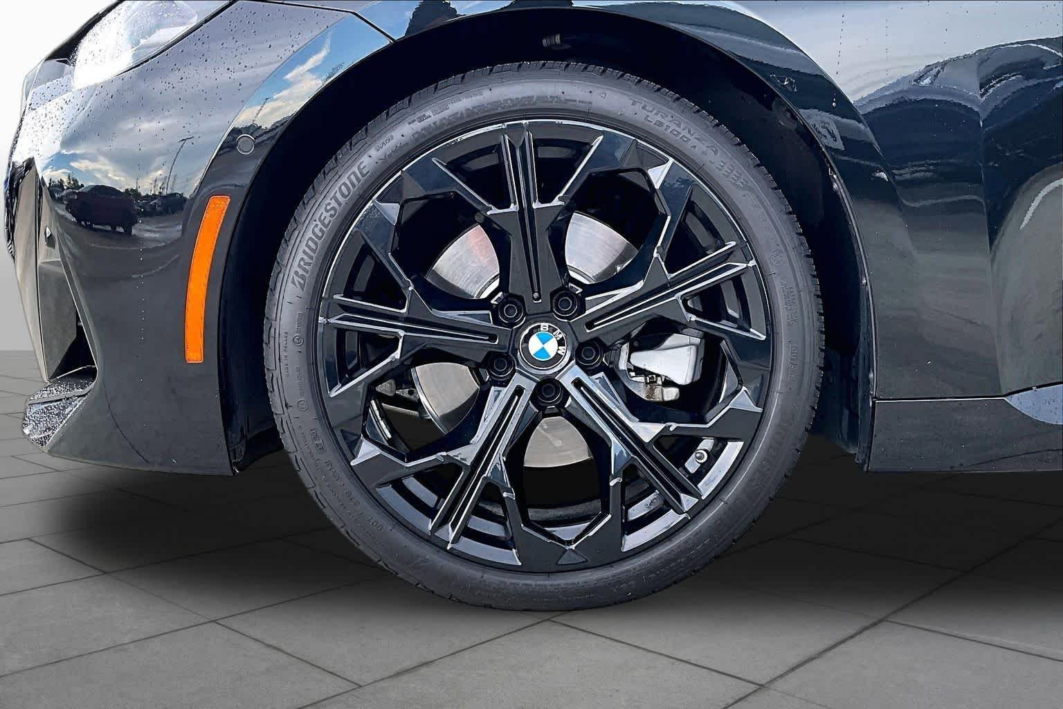 Used 2025 Black Sapphire Metallic BMW 230i xDrive image 11