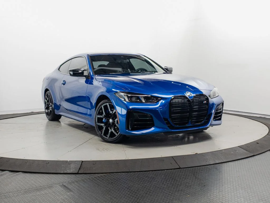 Used 2025 Blue Metallic BMW M440i xDrive image 1