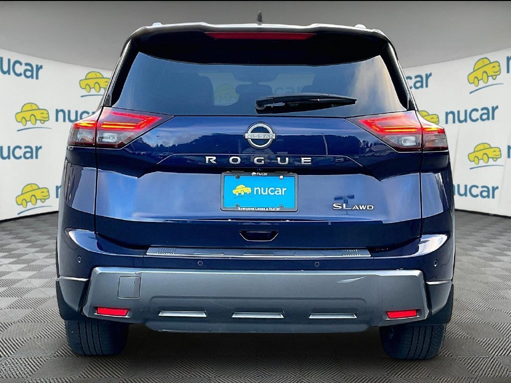 Used 2024 Deep Ocean Blue Pearl/Super Black Nissan SL image 5