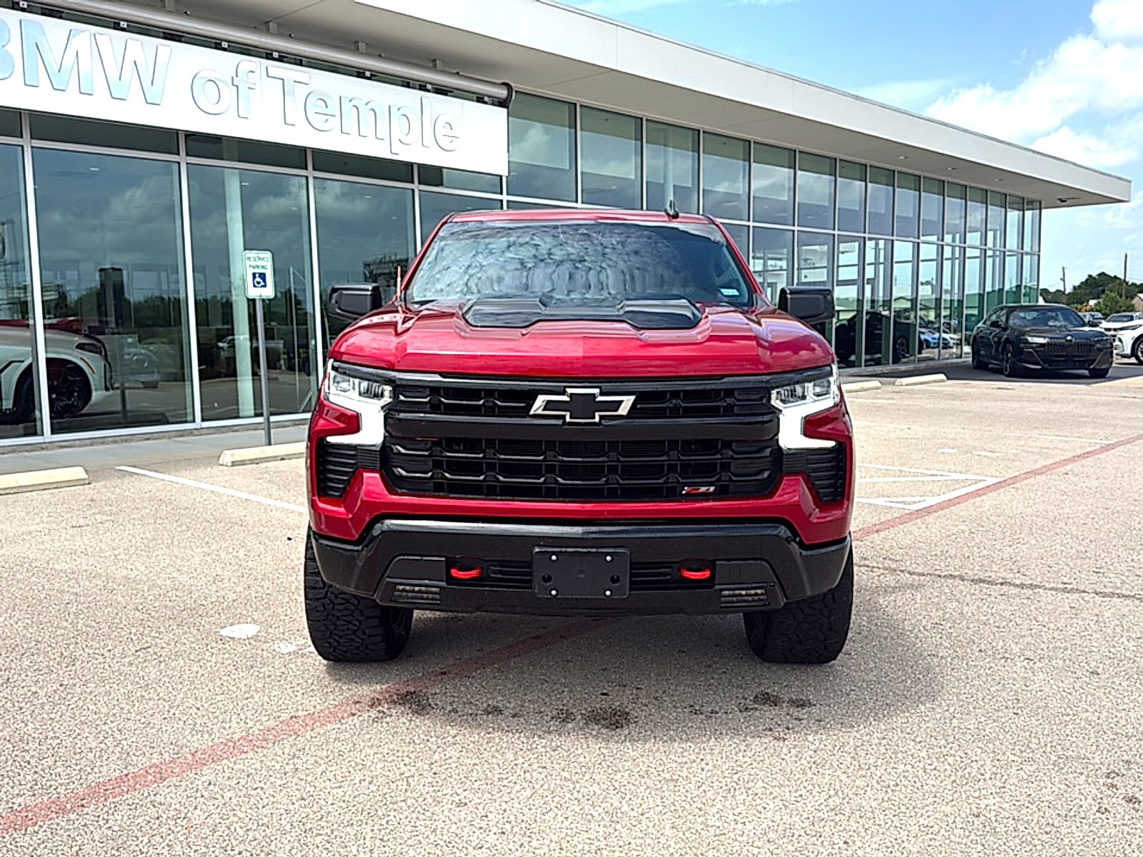 Used 2025 Radiant Red Tintcoat Chevrolet 4WD Crew Cab Short Bed LT Trail Boss image 2
