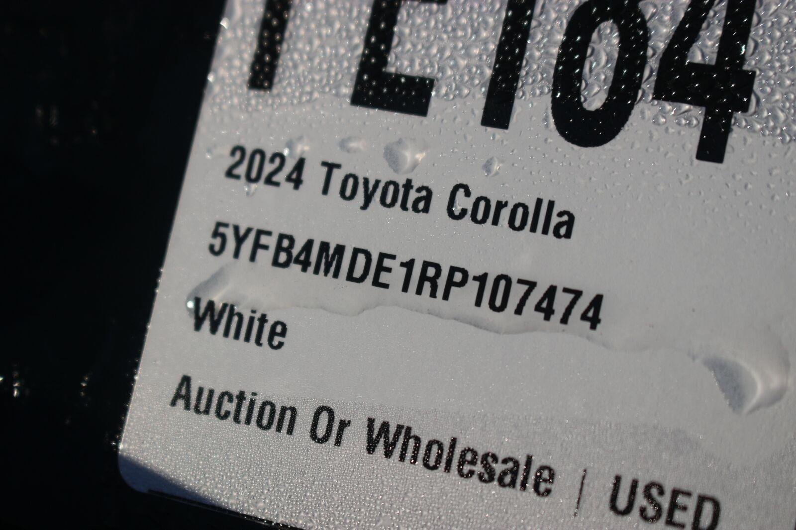 Used 2024 White Toyota LE image 32