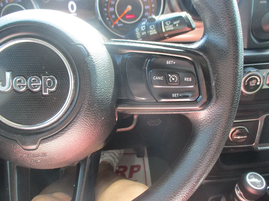 Used 2019 Granite Crystal Metallic Clear Coat Jeep Sport image 11