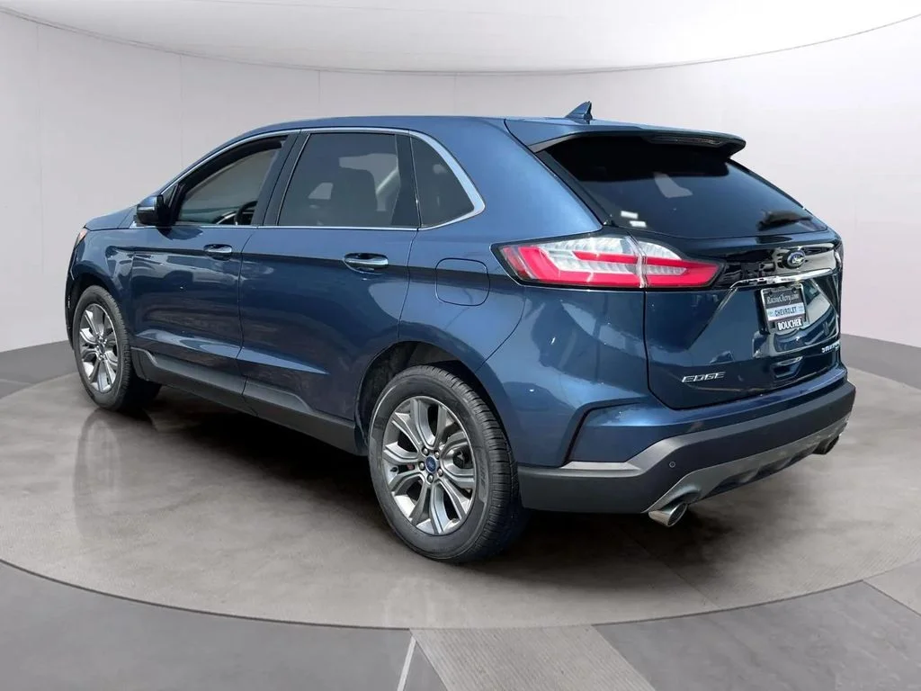 Used 2019 Blue Metallic Ford Titanium image 4