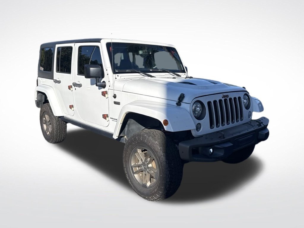 Used 2017 White Jeep Unlimited Sahara image 1