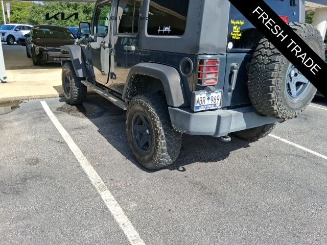 Used 2018 Black Jeep Unlimited Sport image 2