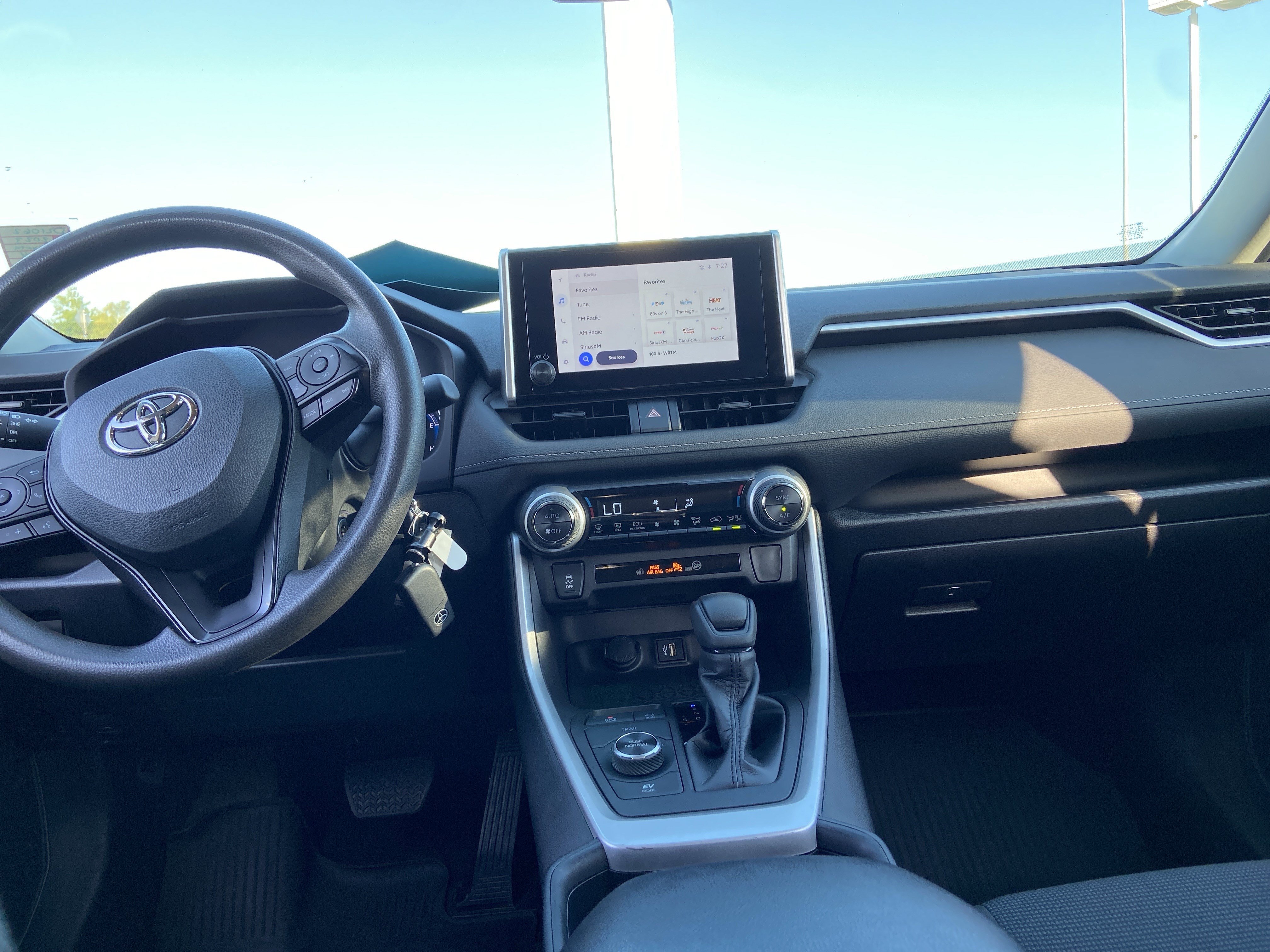 Used 2023 Midnight Black Metallic Toyota Hybrid LE image 9