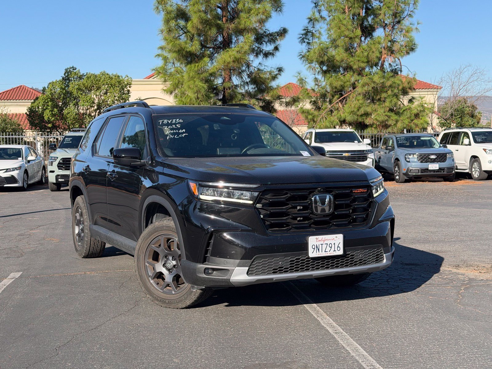 Used 2025 Crystal Black Pearl Honda TrailSport image 1