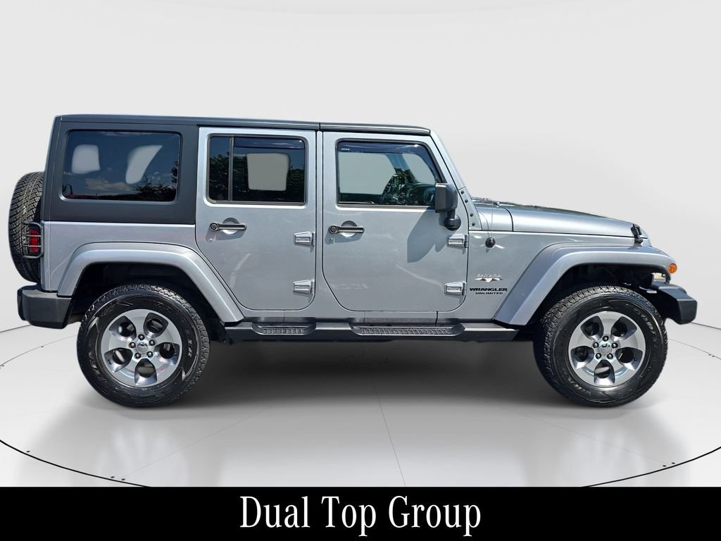Used 2016 Silver Jeep Unlimited Sahara image 4