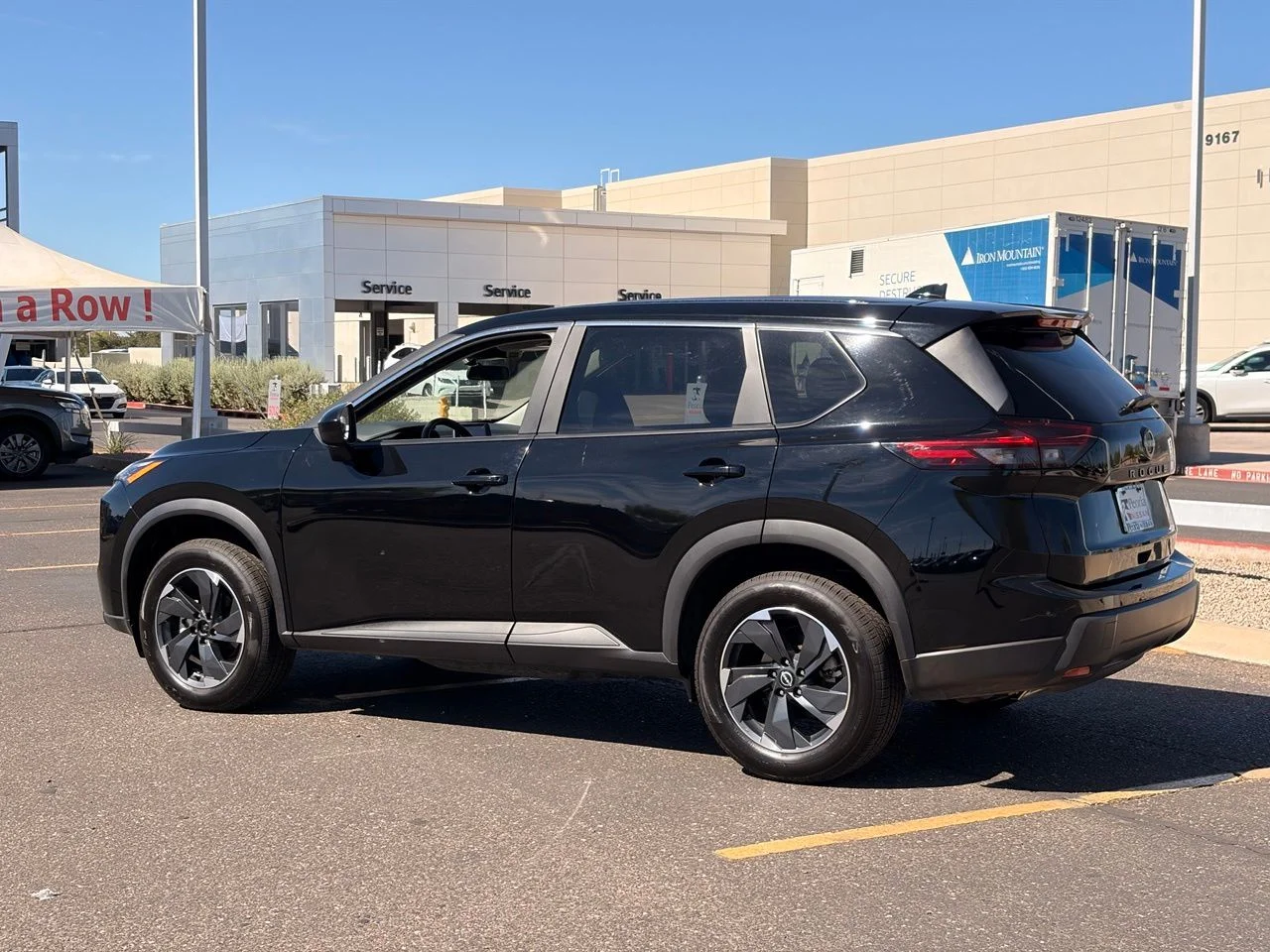 Used 2025 Super Black Nissan SV image 3