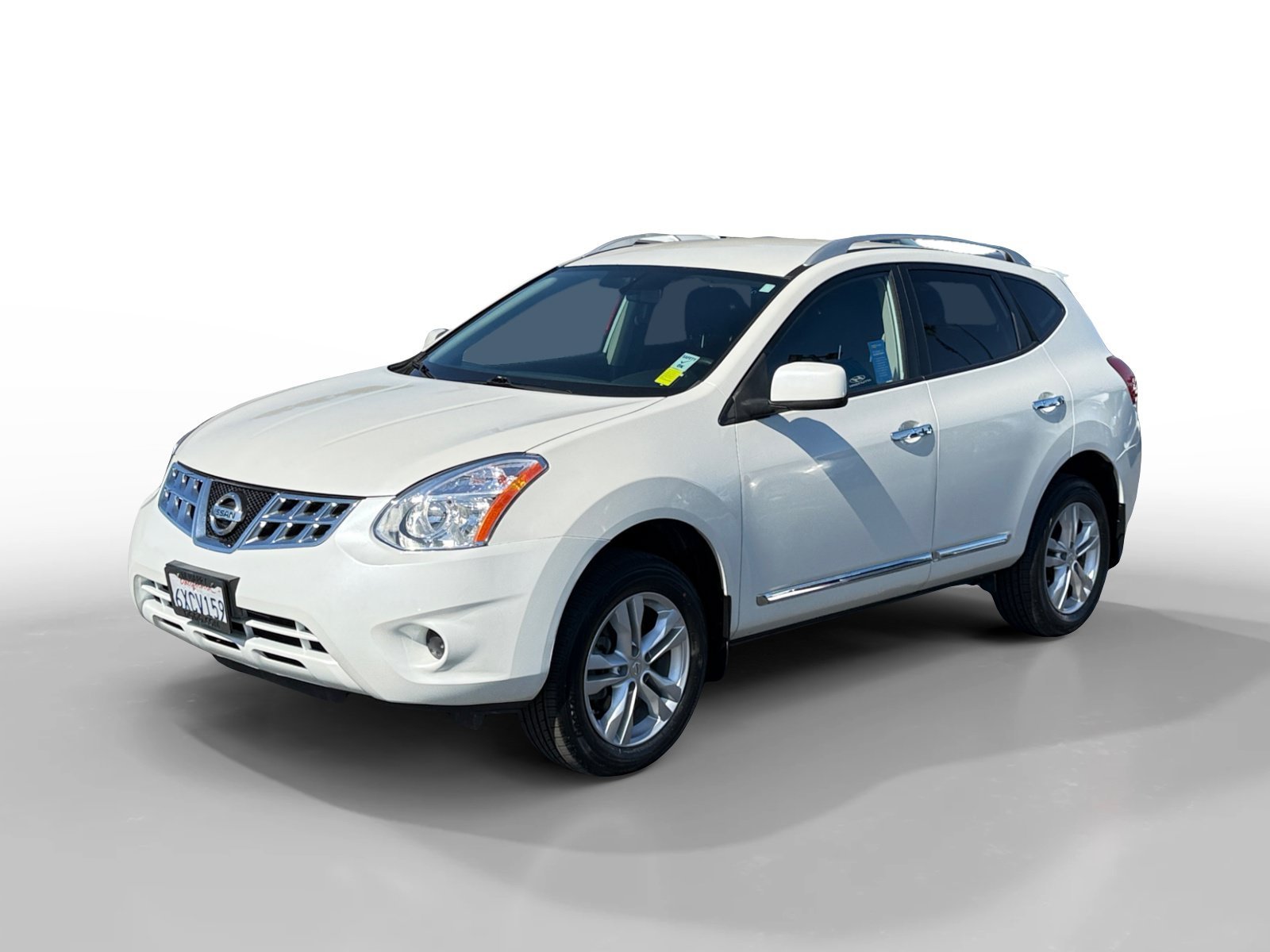 Used 2012 Pearl White Nissan SV image 1