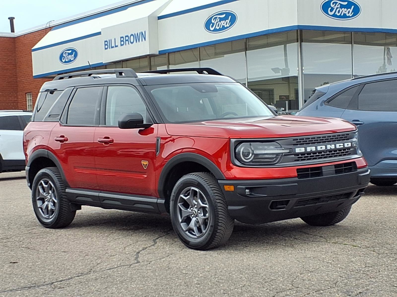 Used 2023 Chili Pepper Red Ford Badlands image 1