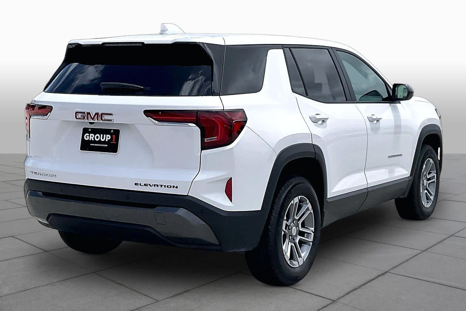Used 2026 Summit White GMC FWD Elevation image 12