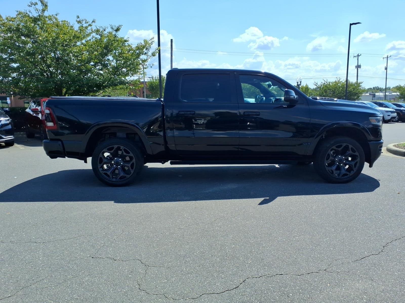 Used 2023 Diamond Black Crystal Pearlcoat Ram Limited image 13