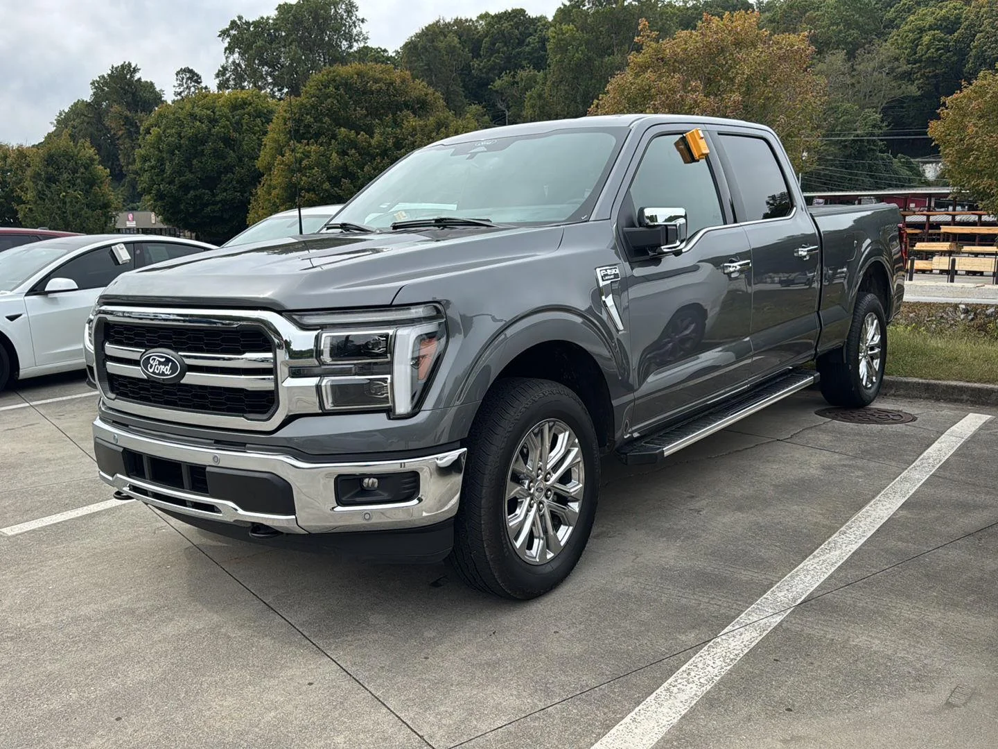 Used 2025 Carbonized Gray Metallic Ford LARIAT image 1
