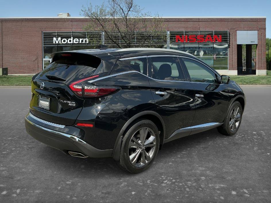 Used 2022 Magnetic Black Pearl Nissan Platinum image 4