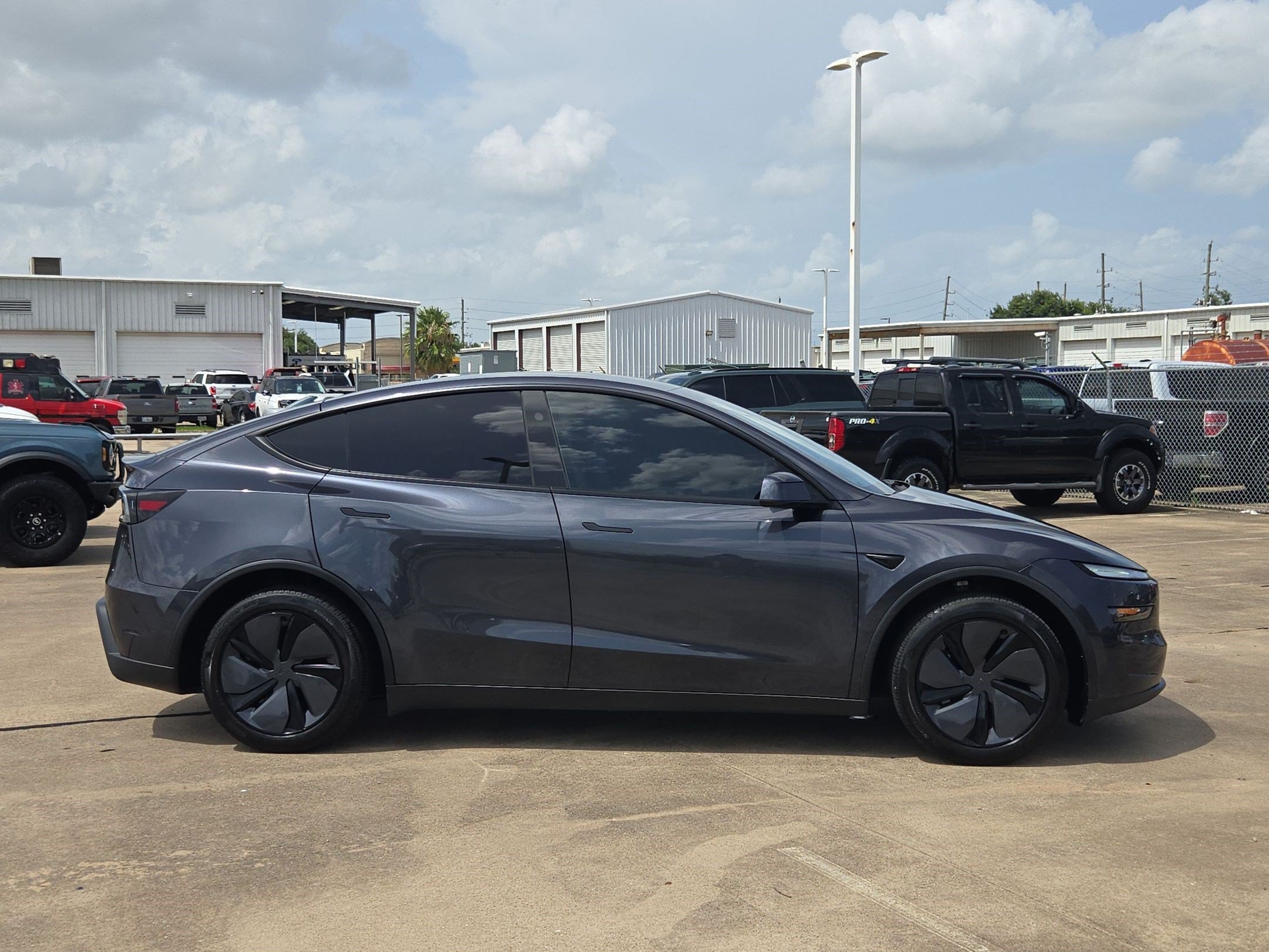Used 2026 Tesla Model Y Premium with VIN 7SAYGDED1TA437237 for sale in Manvel, TX