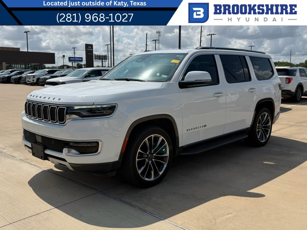 Used 2022 Bright White Clearcoat Jeep Series II image 1