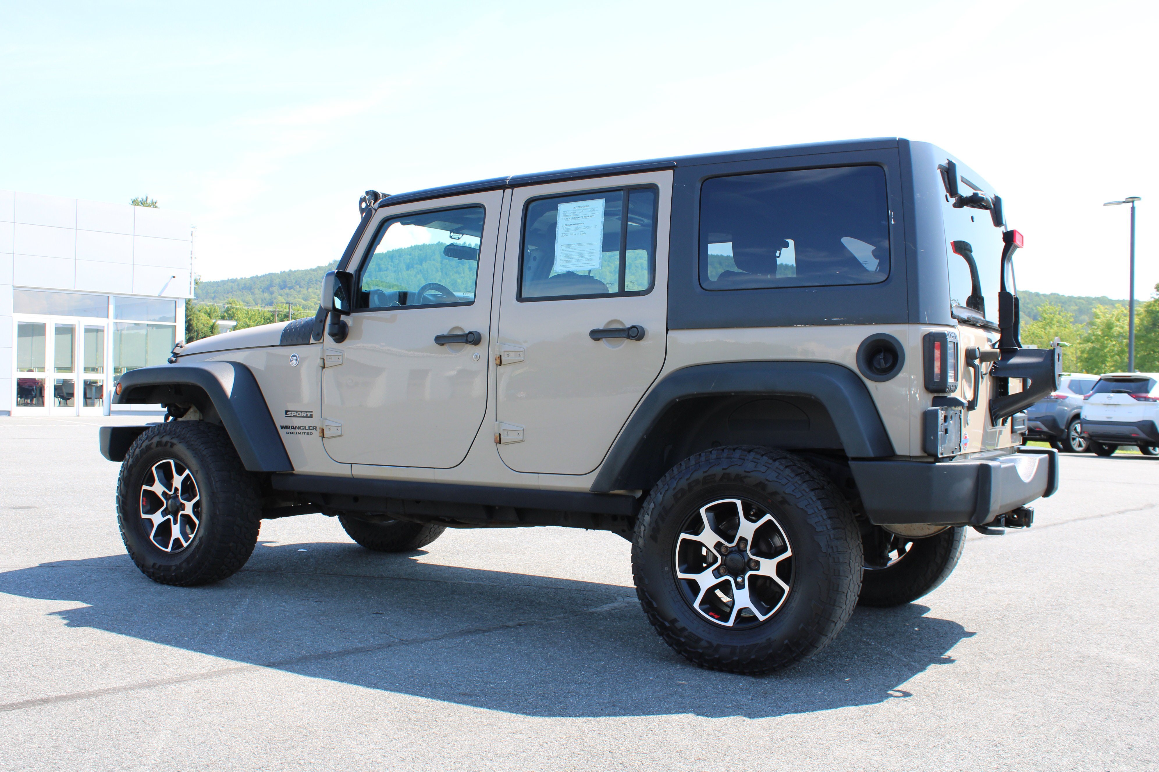 Used 2016 Mojave Sand Clearcoat Jeep Sport image 12