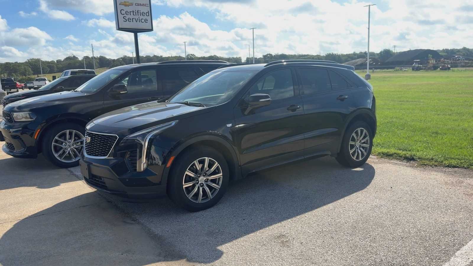Certified Used 2022 Stellar Black Metallic Cadillac FWD Sport image 2
