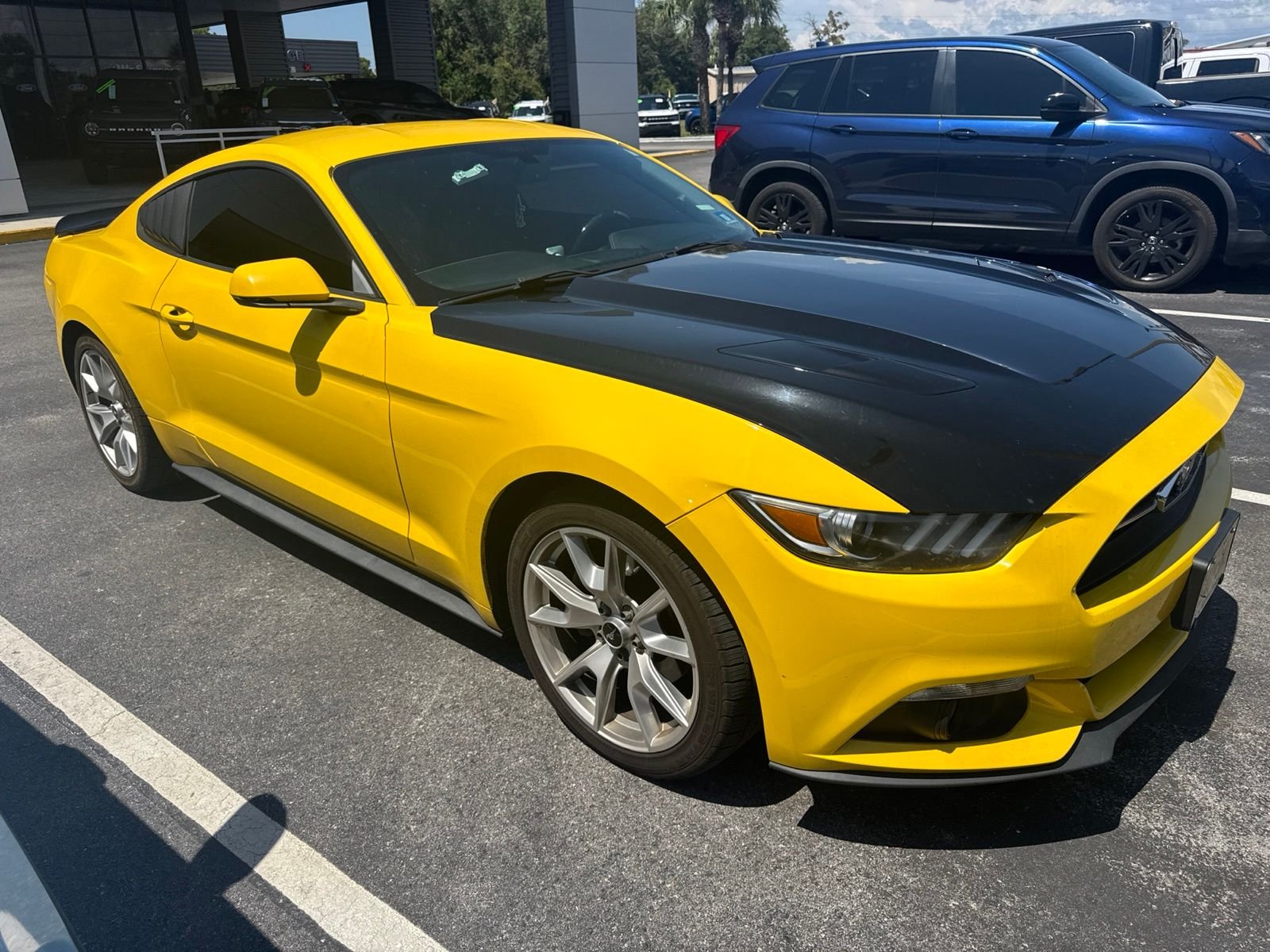 Used 2015 Yellow Ford EcoBoost Premium image 1