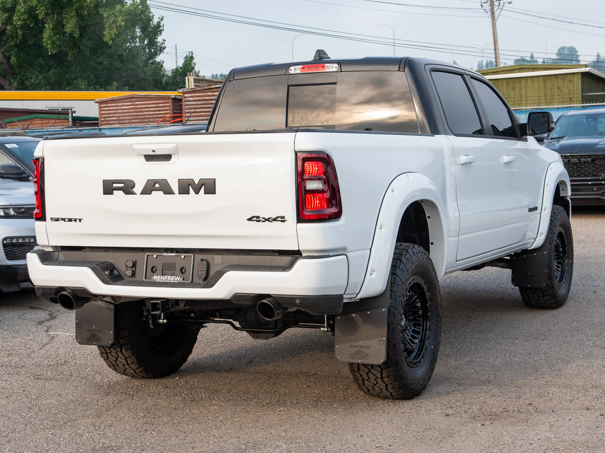 New 2026 White RAM Sport*, 6 Inch Lift, 37 Inch Tires, Trigger Industries Mudflaps image 7