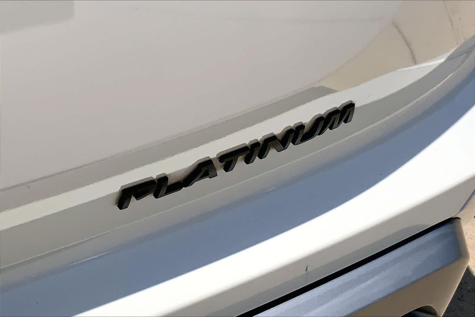 Used 2024 Pearl White Tricoat/Super Black Nissan Platinum image 10